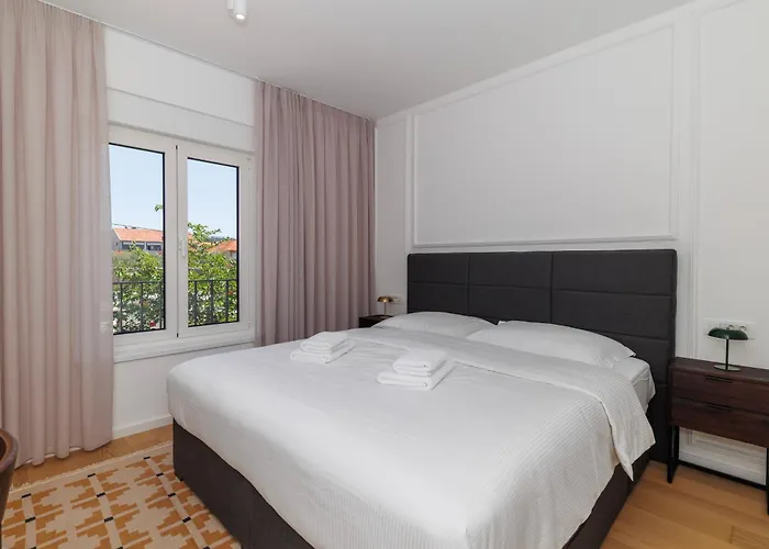 Zora By Belmont Realty *