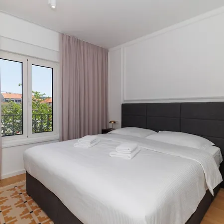 Zora By Belmont Realty *