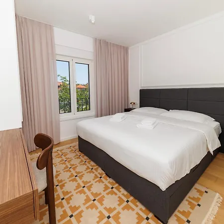 Zora By Belmont Realty *