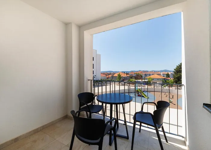 Zora By Belmont Realty *