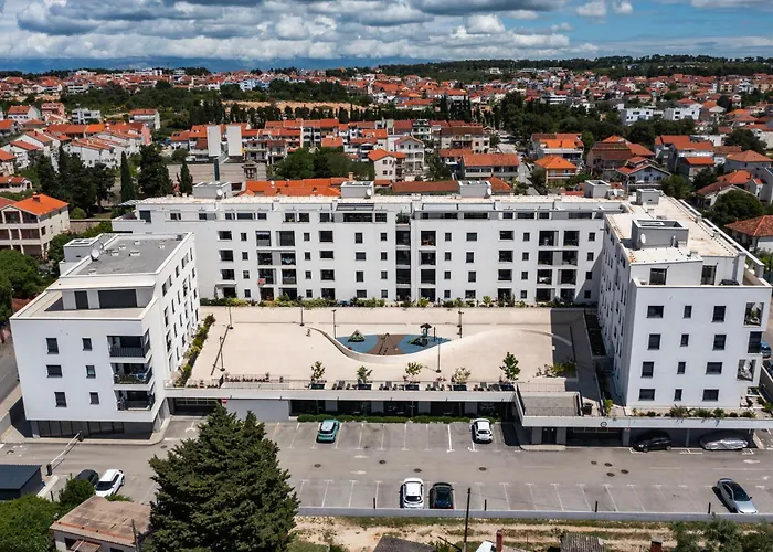 Zora By Belmont Realty *